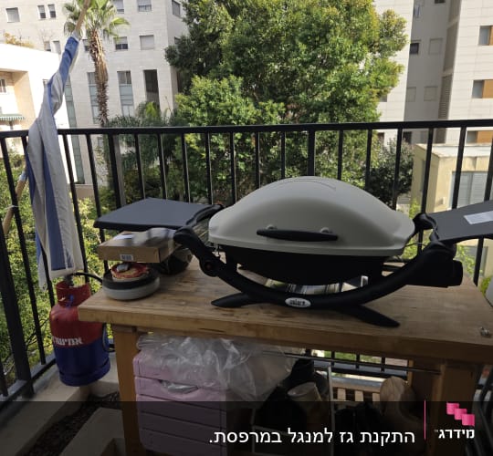 התקנת גז למנגל במרפסת.